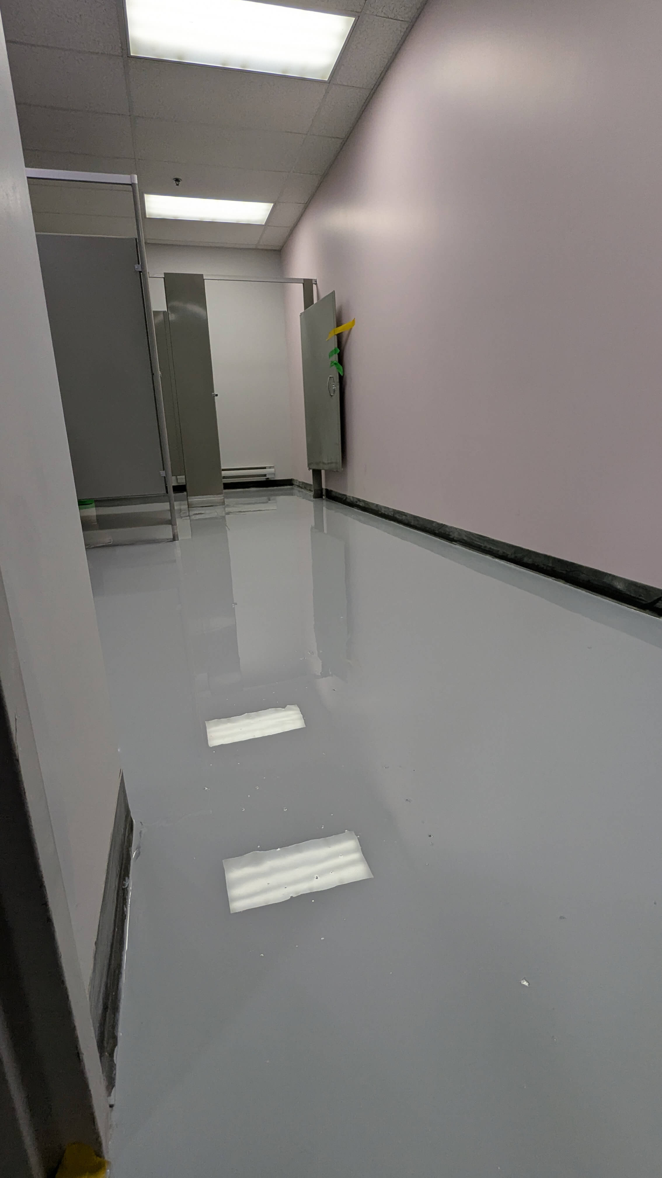 Professional retail epoxy flooring in Toronto - high-gloss finish for boutique store