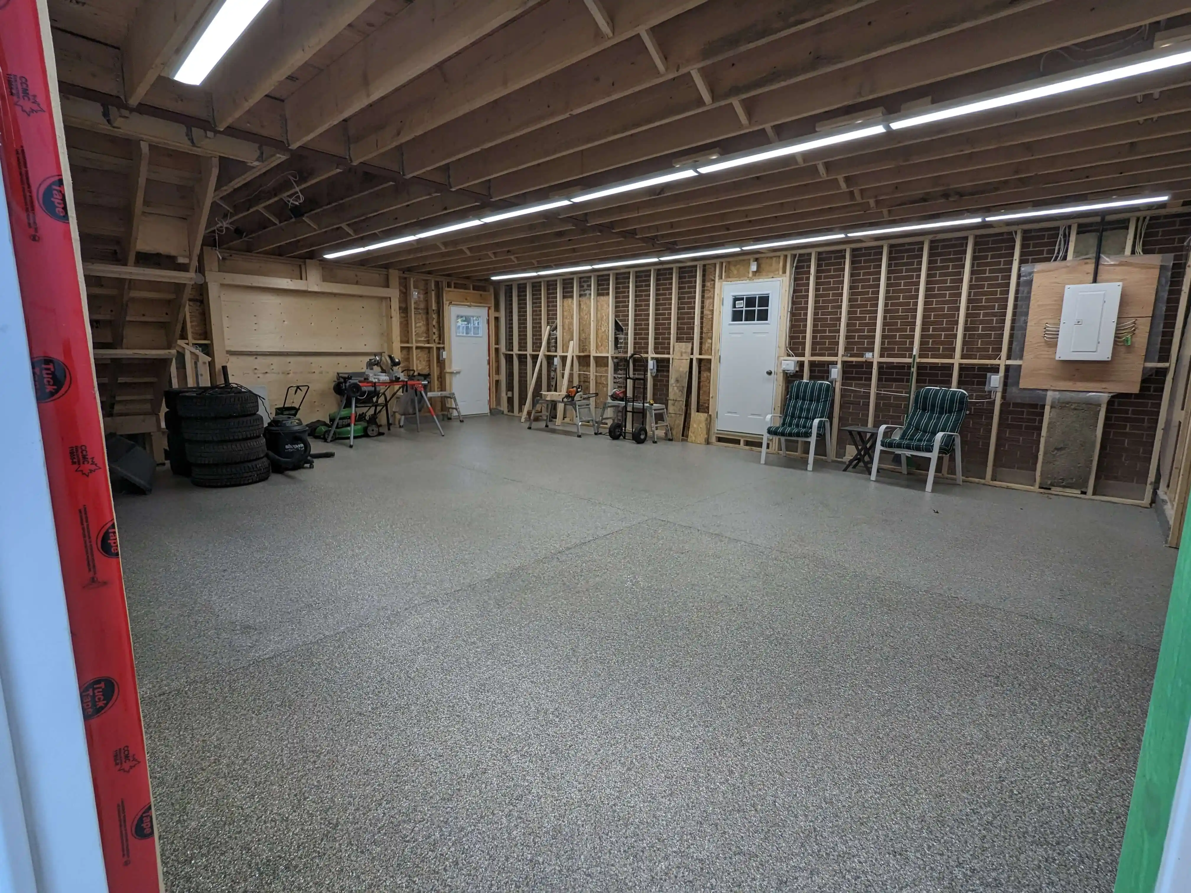 Commercial epoxy flooring installation in an Aurora boutique retail space