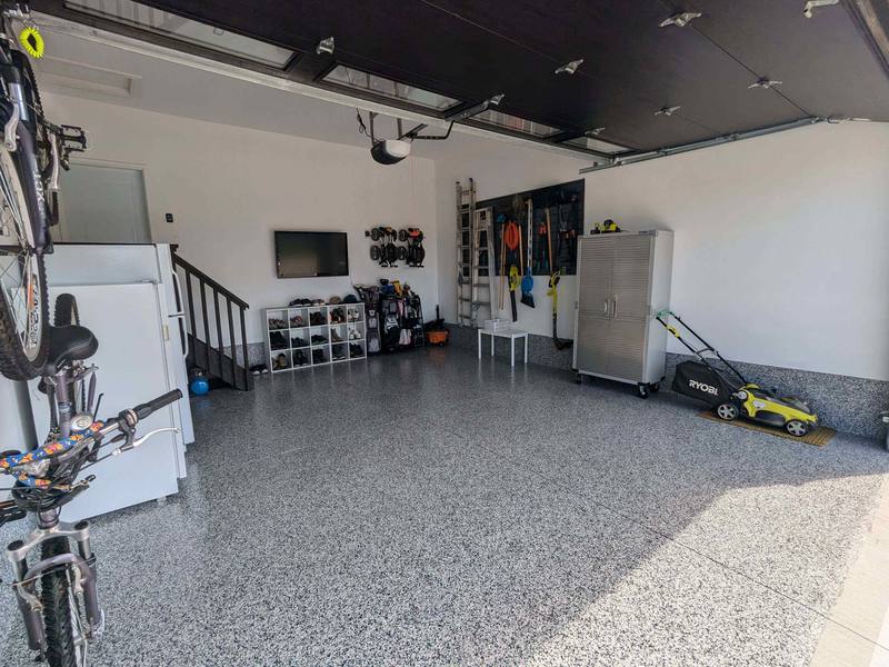 Professional residential garage epoxy flooring Toronto - glossy durable finish