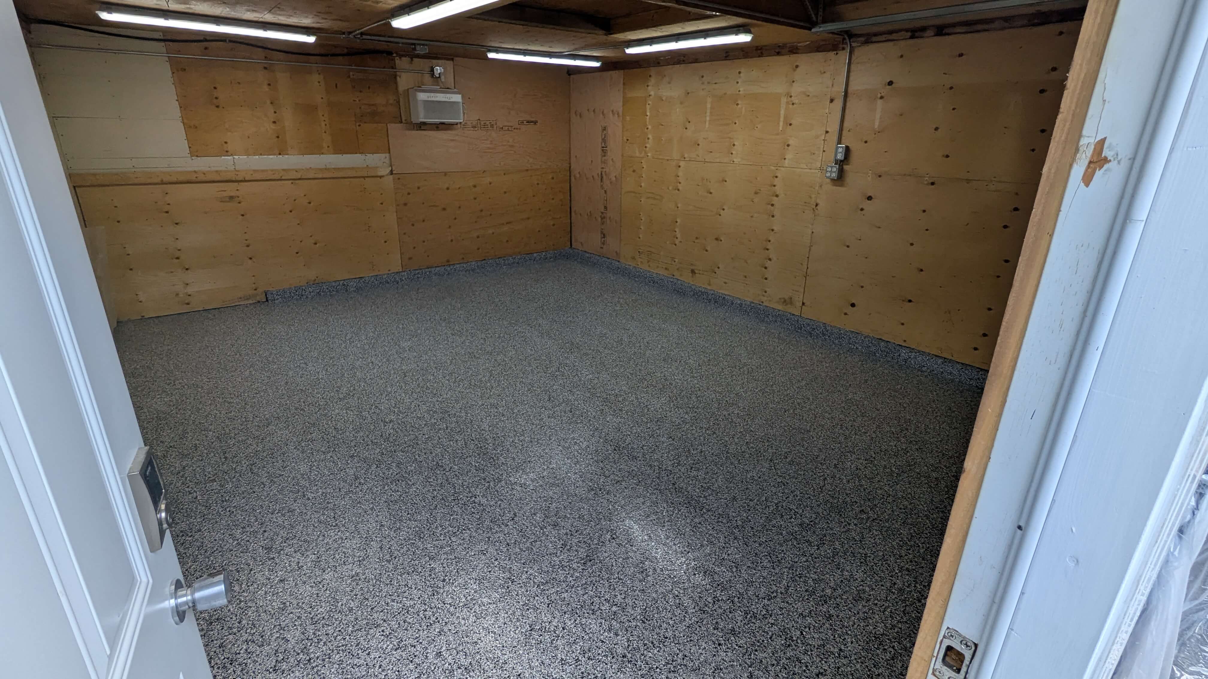 Custom epoxy garage flooring with anti-slip texture in Burlington