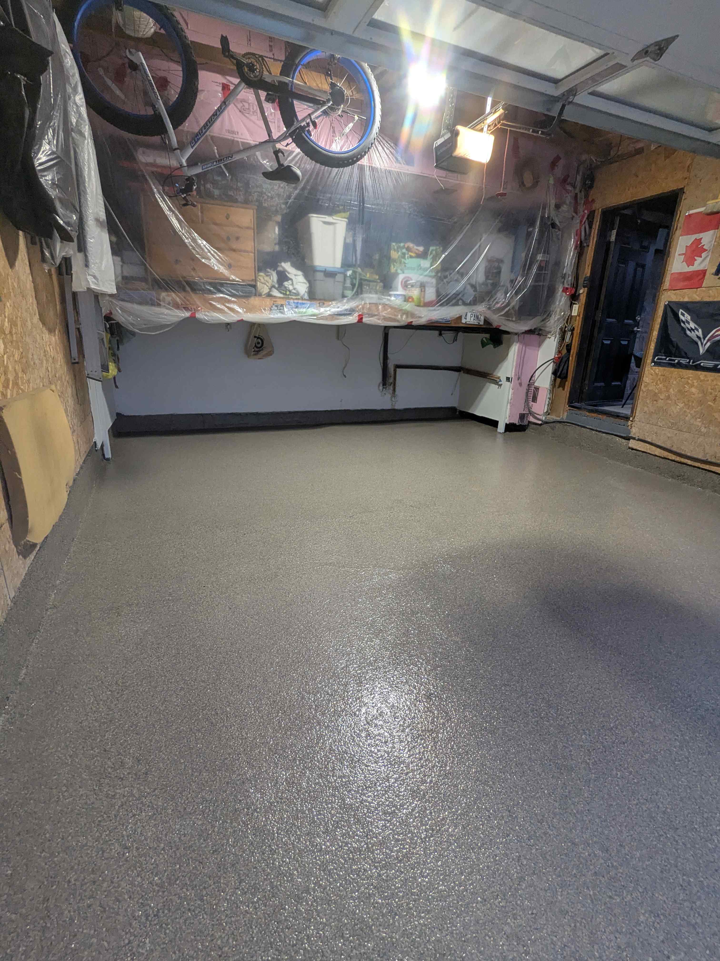 Garage epoxy flooring with decorative quartz and color blend in Pickering