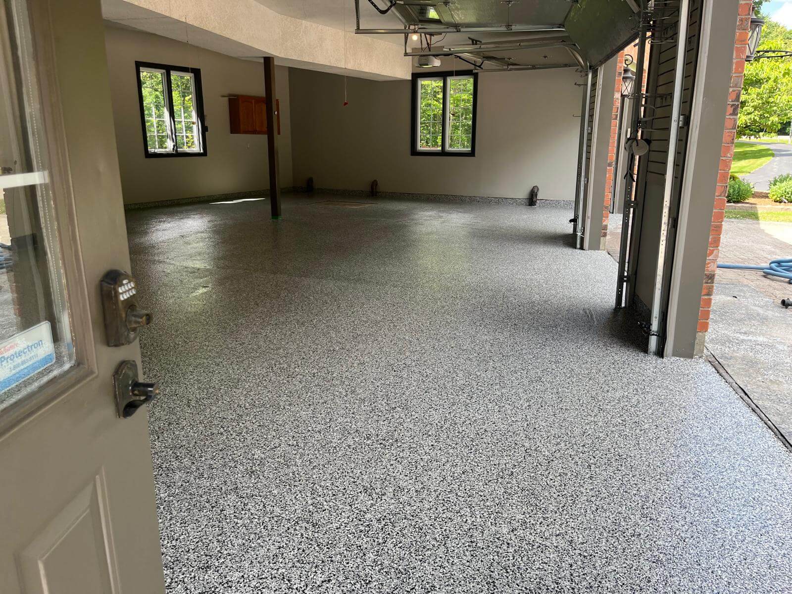 Professional epoxy flake installation process by experienced team