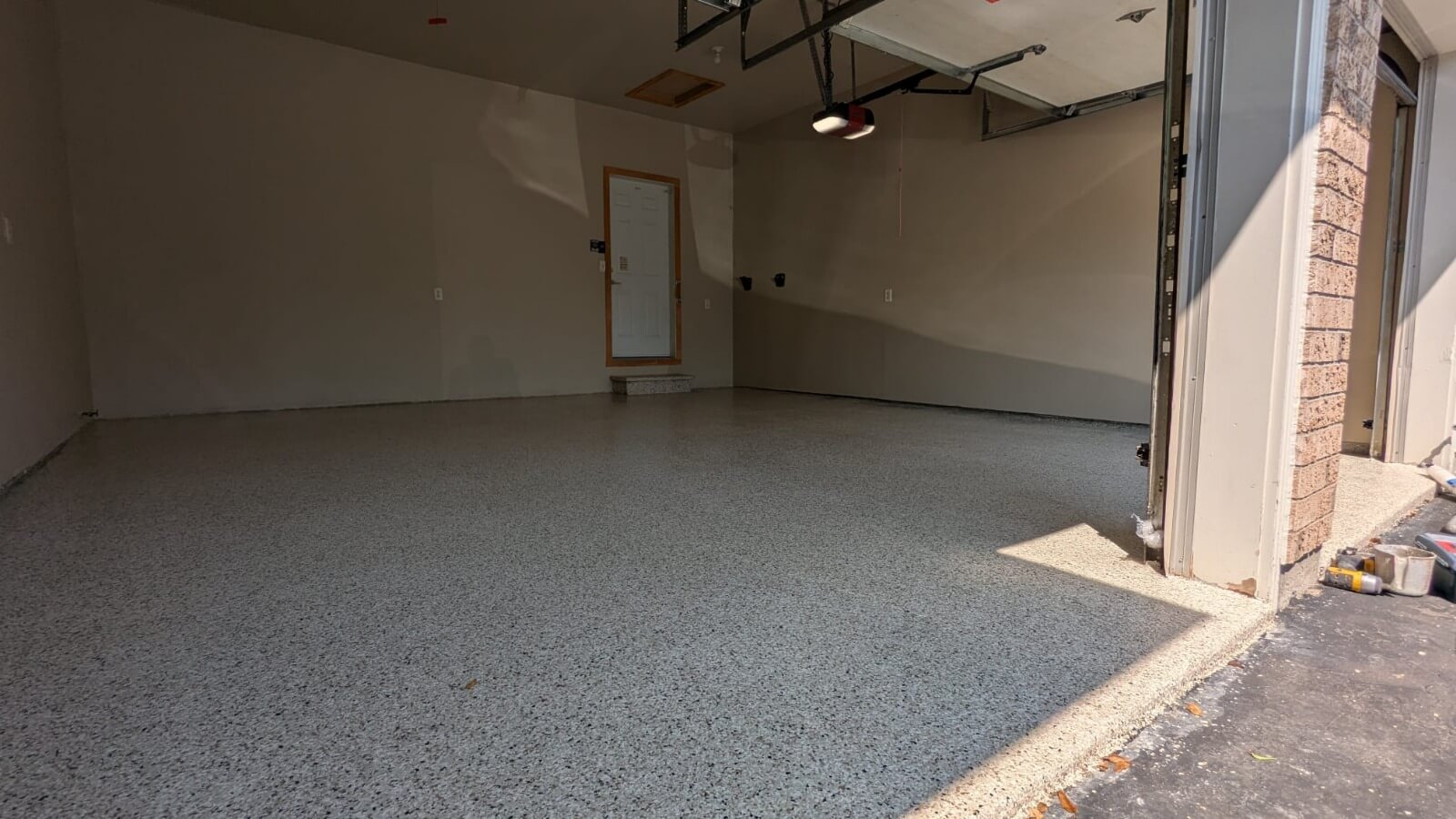 Metallic epoxy garage flooring with shimmering finish in Markham