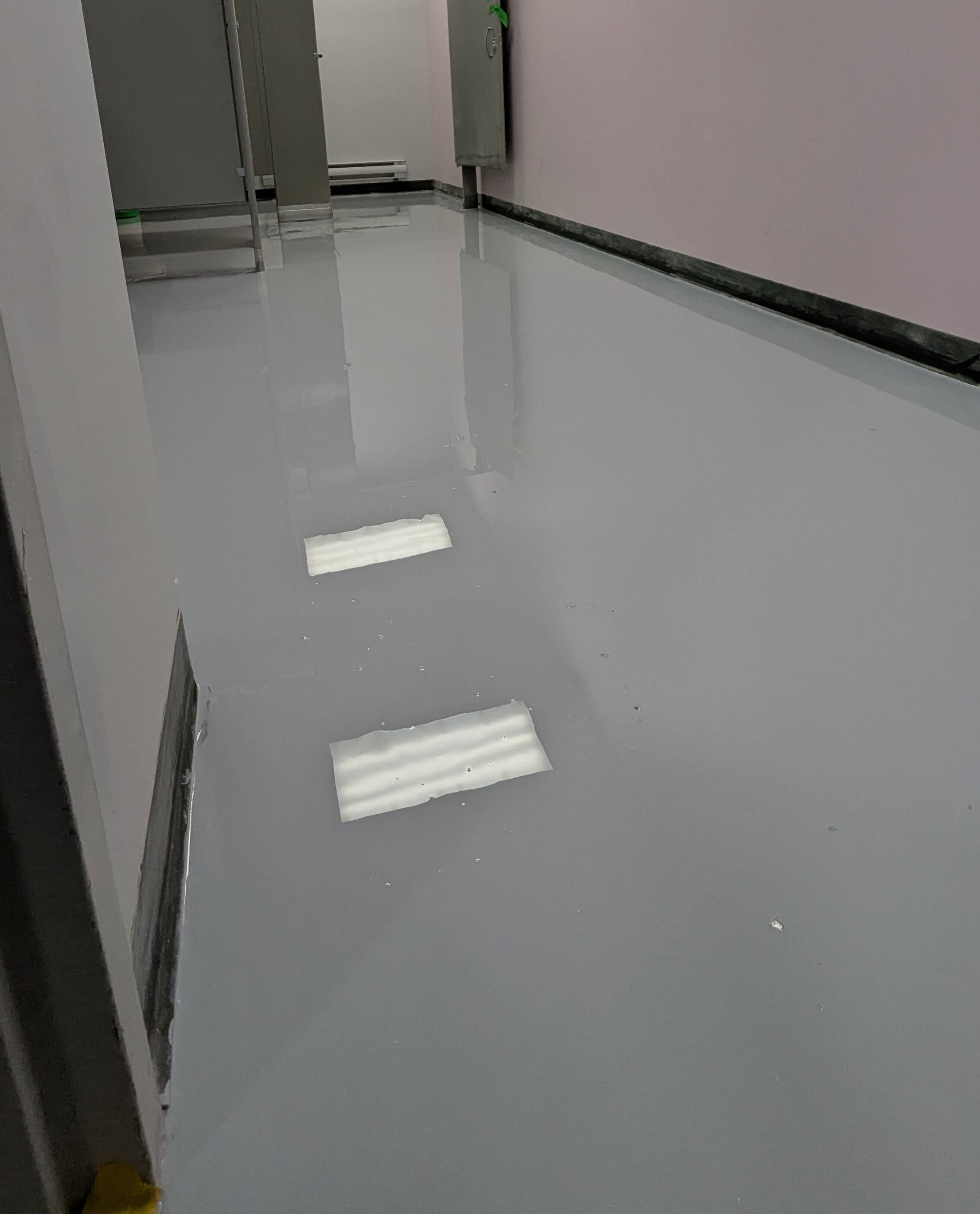 Forklift-rated warehouse epoxy flooring in Toronto - heavy-duty coating for logistics facility