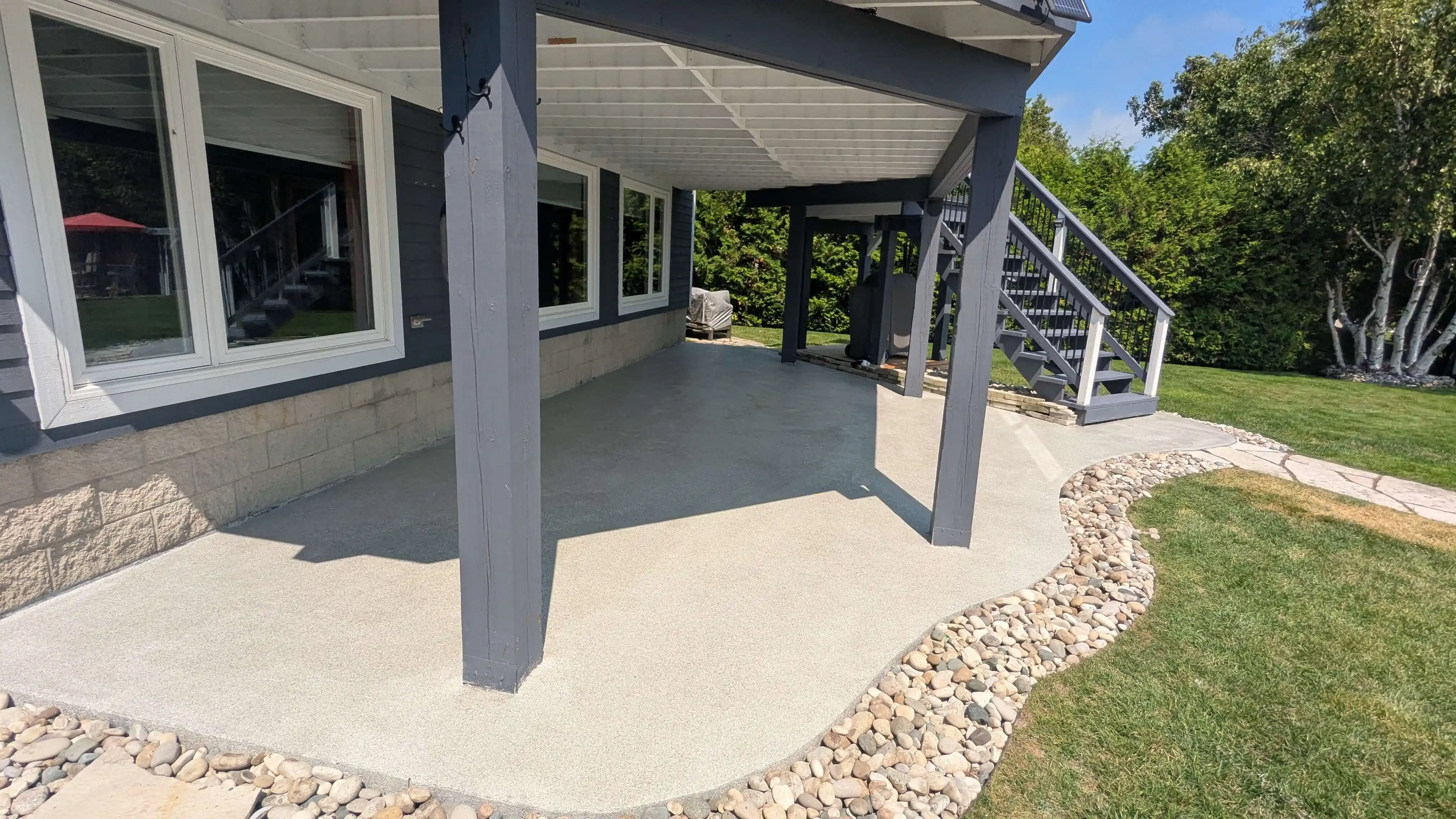Outdoor porch with UV-resistant epoxy flooring