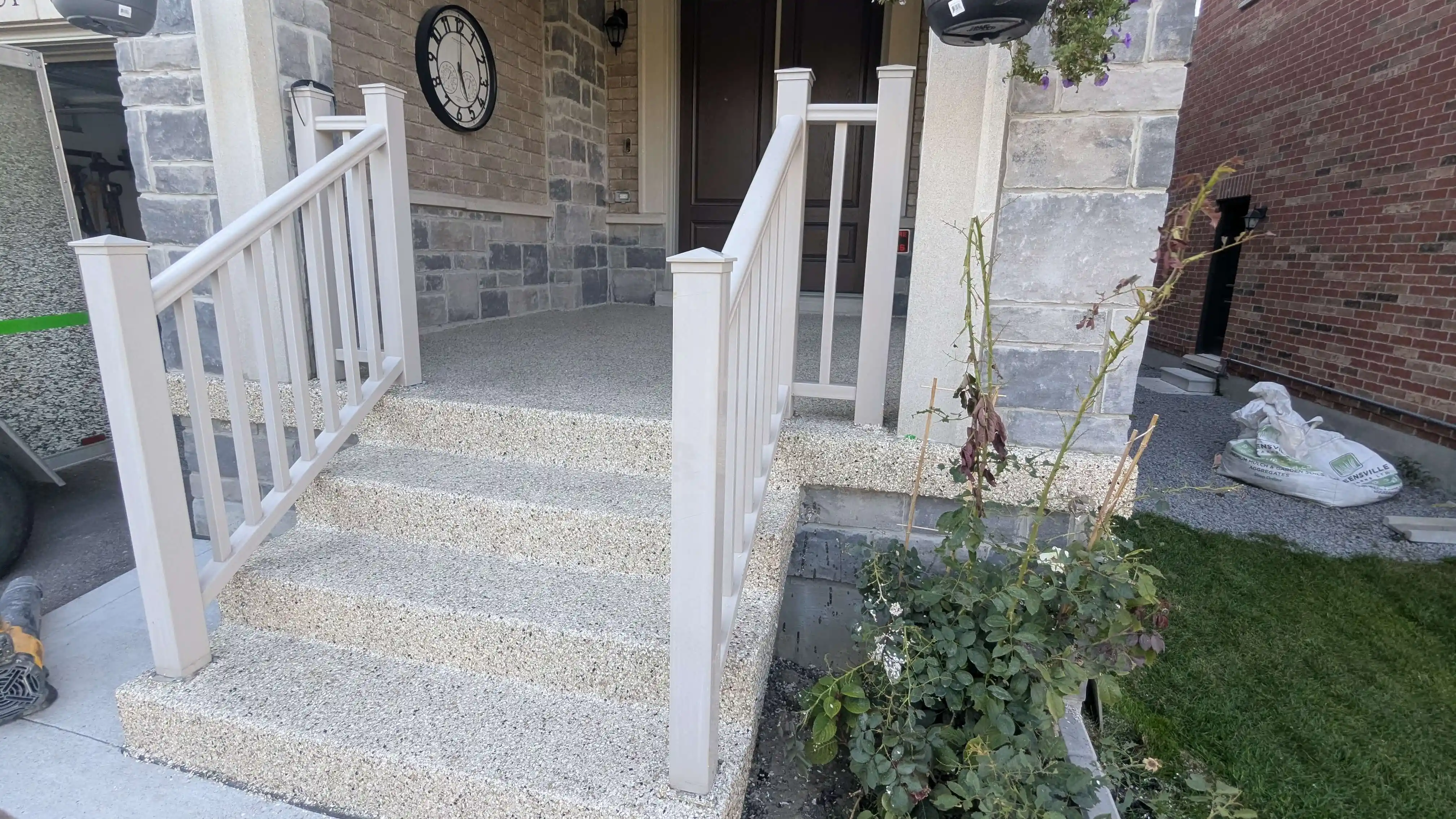 Front entrance epoxy flooring installation in Etobicoke